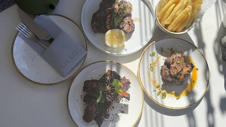 Wings, steak and ribs with chips dish at Ukko restaurant
