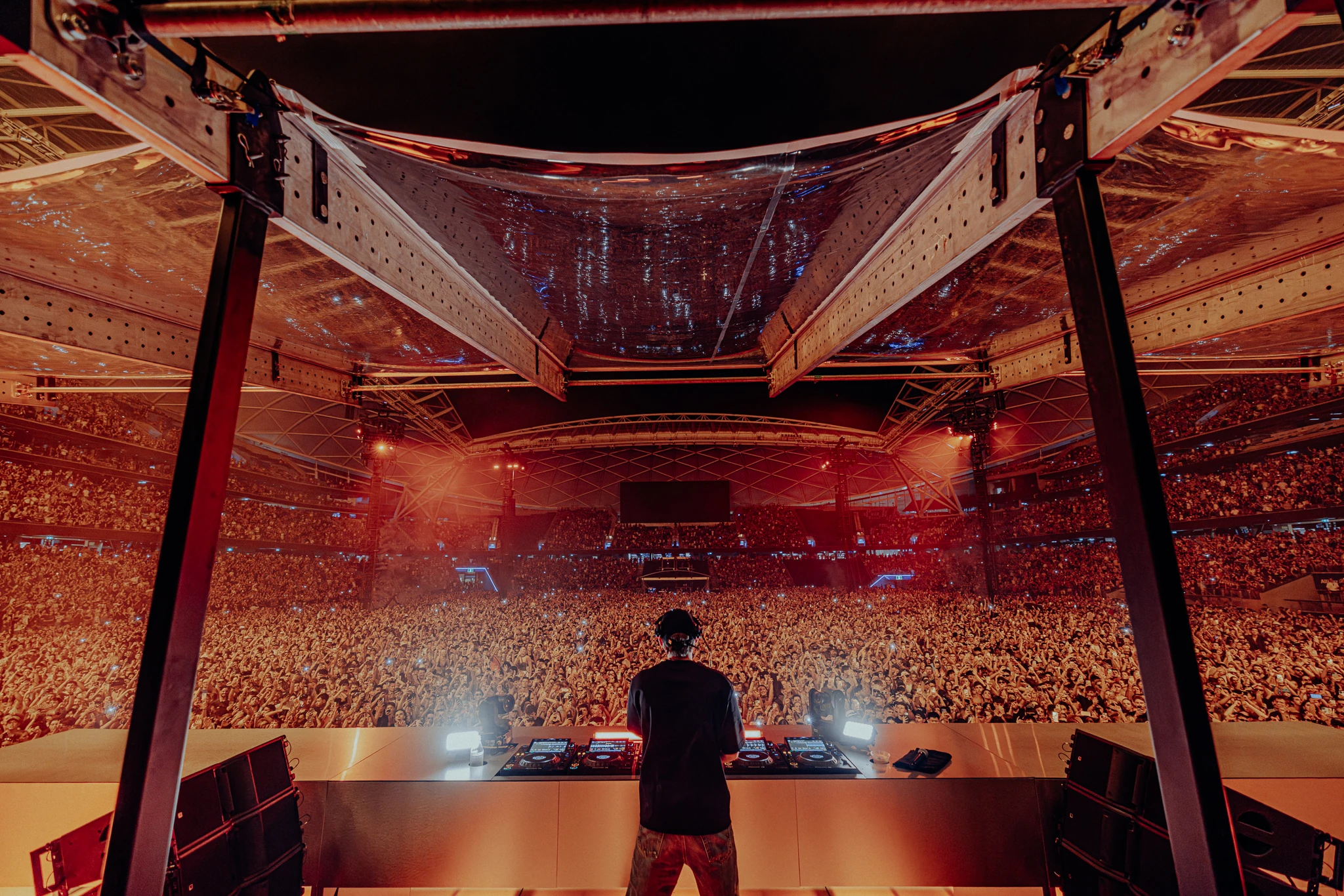 Dom Dolla playing at a massive stadium.
