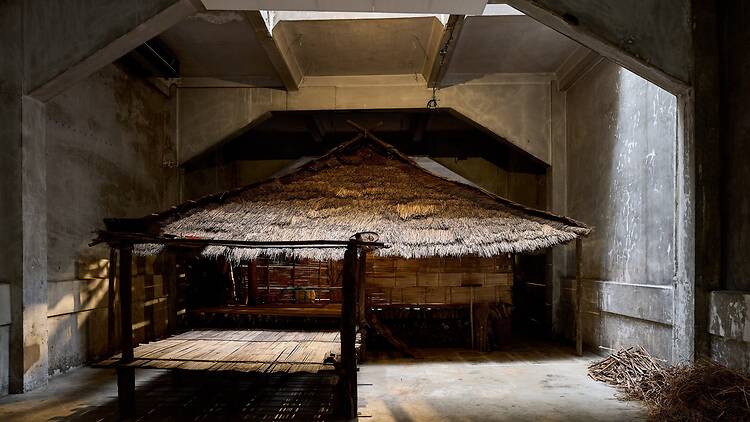 Step inside a real Akha house, rebuilt timber-by-timber
