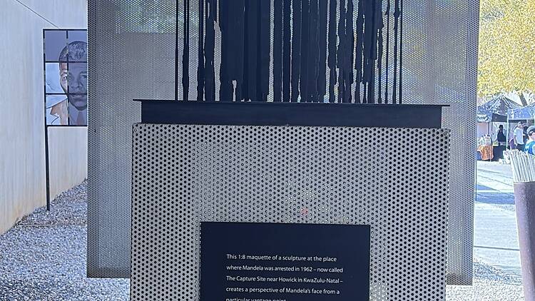 Sculpture showing where Mandela was arrested at the Apartheid Museum 