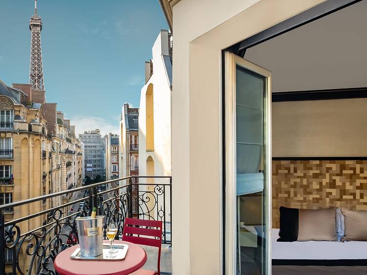 Room and terrace at Hotel Le Derby Alma in Paris Room and terrace at Hotel Le Derby Alma in Paris