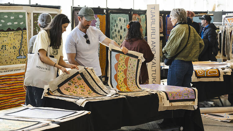 people looking at art at National Indigenous Art Fair