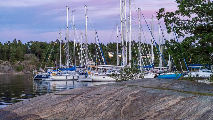 Jump barefoot on the rocks in the Stockholm archipelago Jump barefoot on the rocks in the Stockholm archipelago