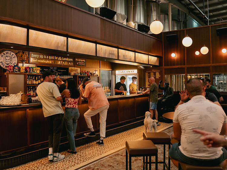 The Bob Hawke Beer & Leisure Centre people drinking at the bar at The Bob Hawke Beer & Leisure Centre