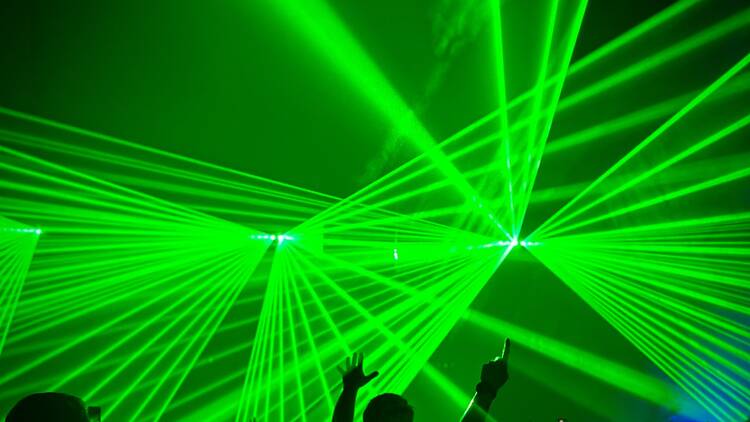 Stock image of a nightclub with green strobes Stock image of a nightclub with green strobes