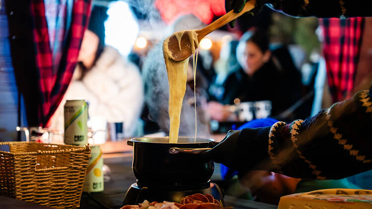 Fondue Chalet A pot of fondue cheese