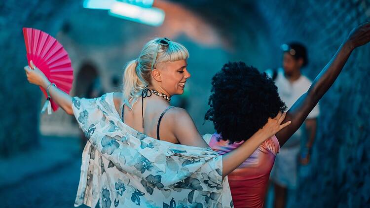 Two young women dancing Two young women dancing