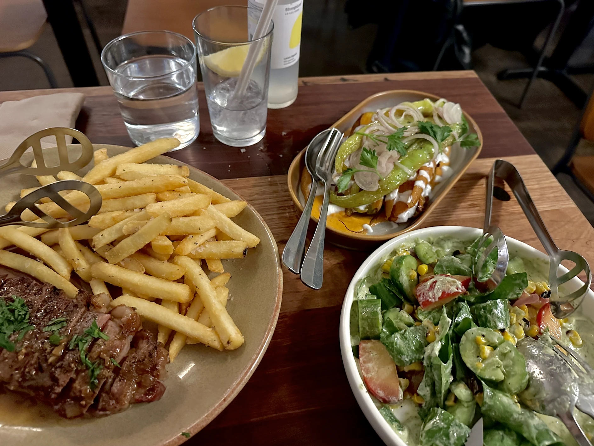 Steak and salads at Mishy's