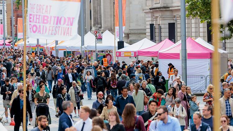 Crowds walking passed pop-up stalls on Great Exhibition Road
