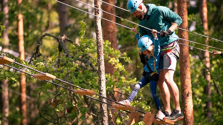 Take on a high ropes course at Högt & Lågt Take on a high ropes course at Högt & Lågt