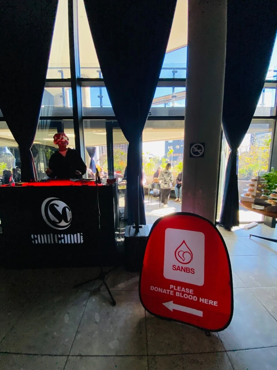 Even while donating blood, guests remained connected to the event.  