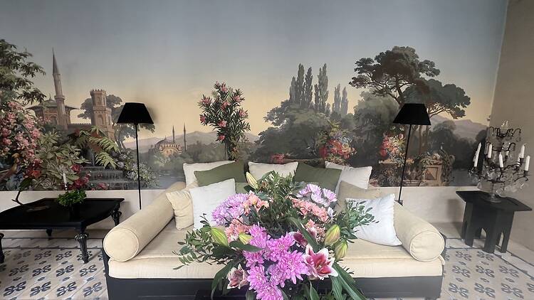 A common area at Riad Tarabel complete with mural
