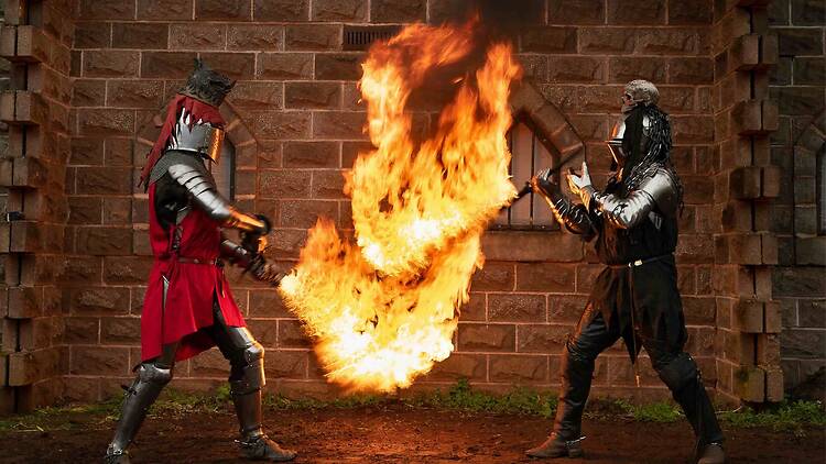 Ballarat Winter Festival Knights of Fire two people dressed as knights joust with fire