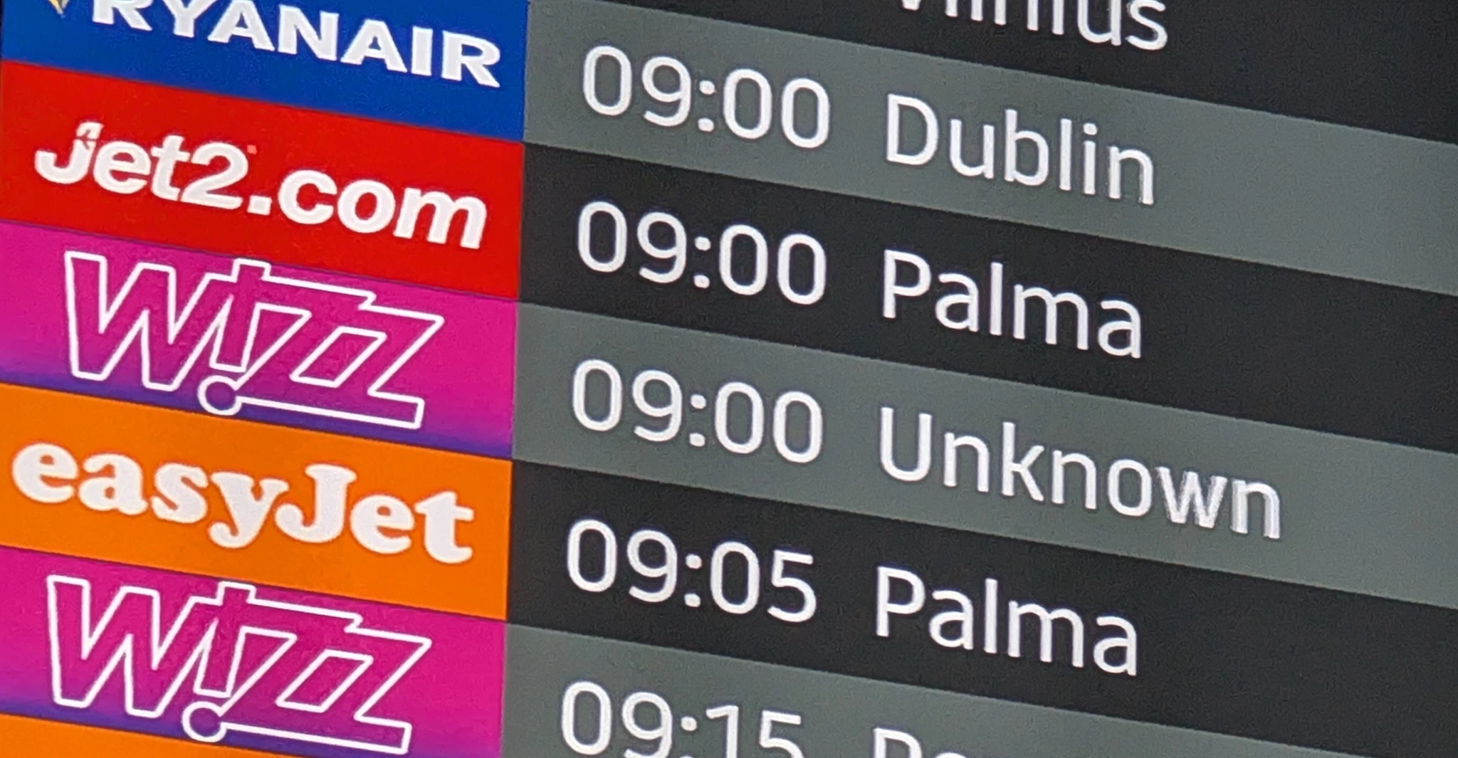 A departure board reading 'Unknown'