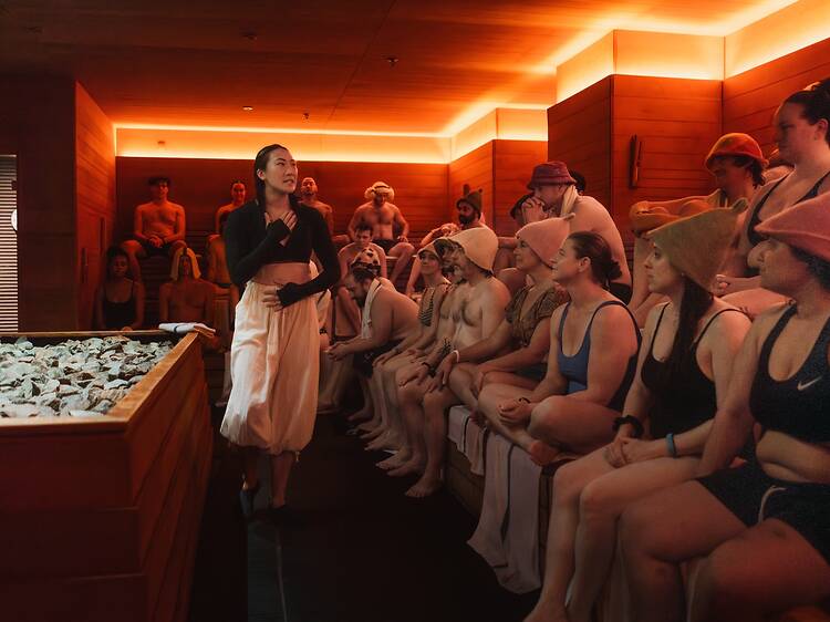 I sat in a sauna with 80 other people as we all gawked at the Aufguss Finals