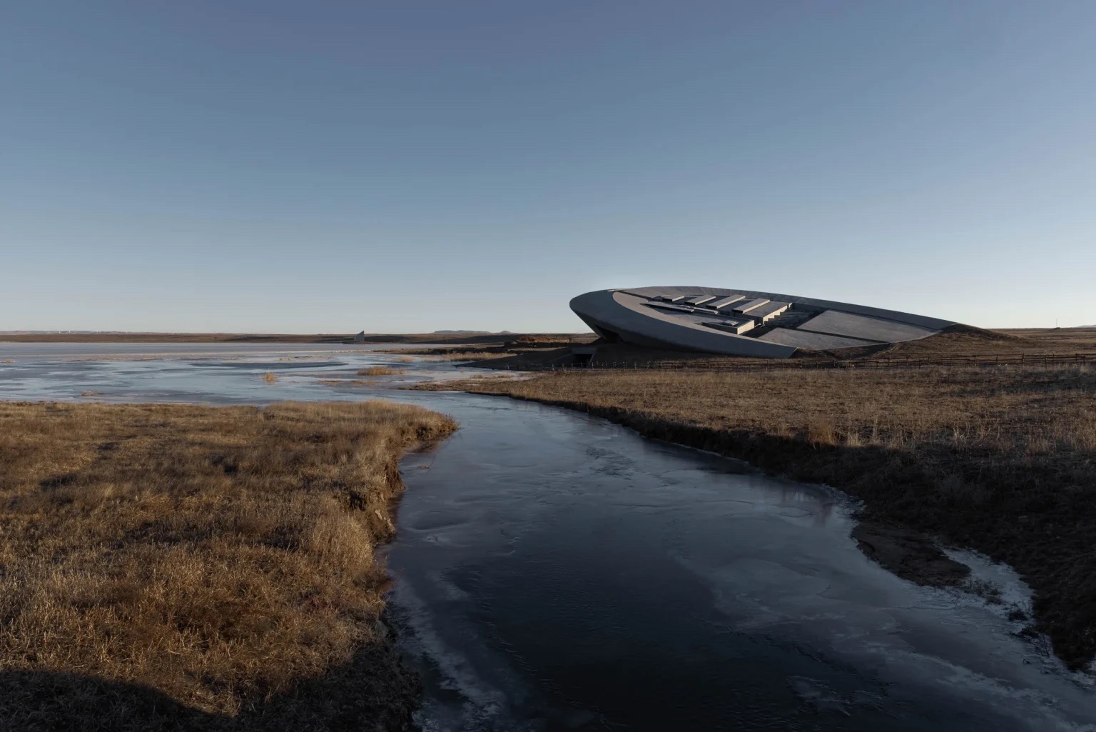 This contemporary art gallery in Inner Mongolia looks like a UFO just landed on the grasslands