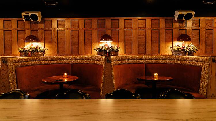 Two booths in the bar area.