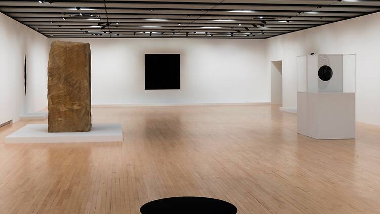 Installation view of Anish Kapoor showing ‘Descent into Limbo’ (1992) in the foreground