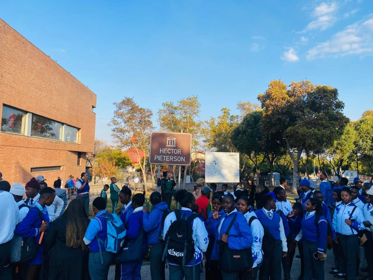 Schoolchildren gather outside the Hector Pieterson museum. 