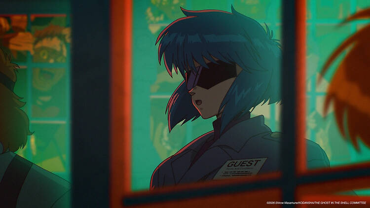 a screencap of The Ghost in the Shell shows Motoko Kusanagi at the center.