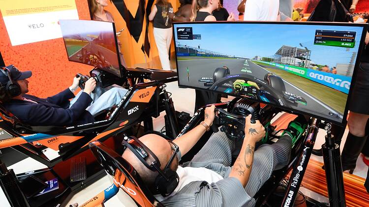 McLaren Mastercard Formula 1 Team pop-up Visitors try out the F1 simulators at the VELO x McLaren Mastercard Formula 1 Team pop-up