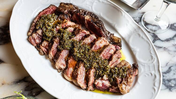 Steak with a sauce on it