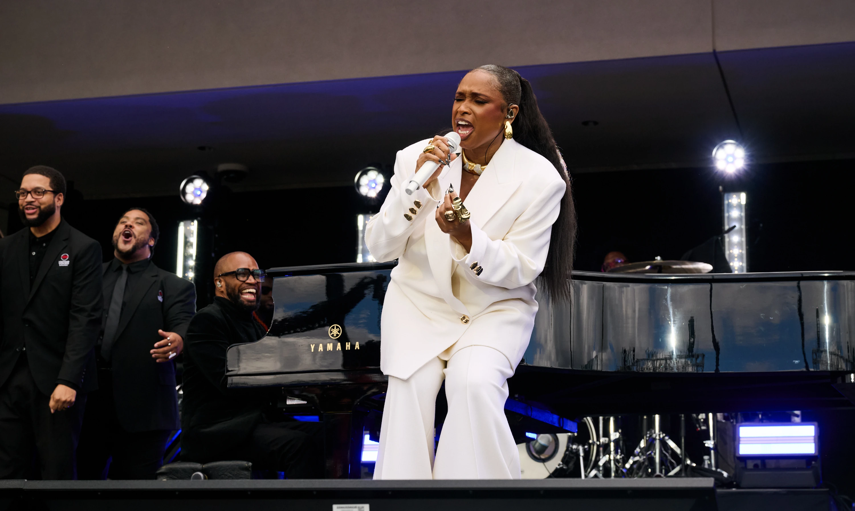Jennifer Hudson performs The National Anthem and The Impossible Dream during the Grand Opening Dedication Ceremony.