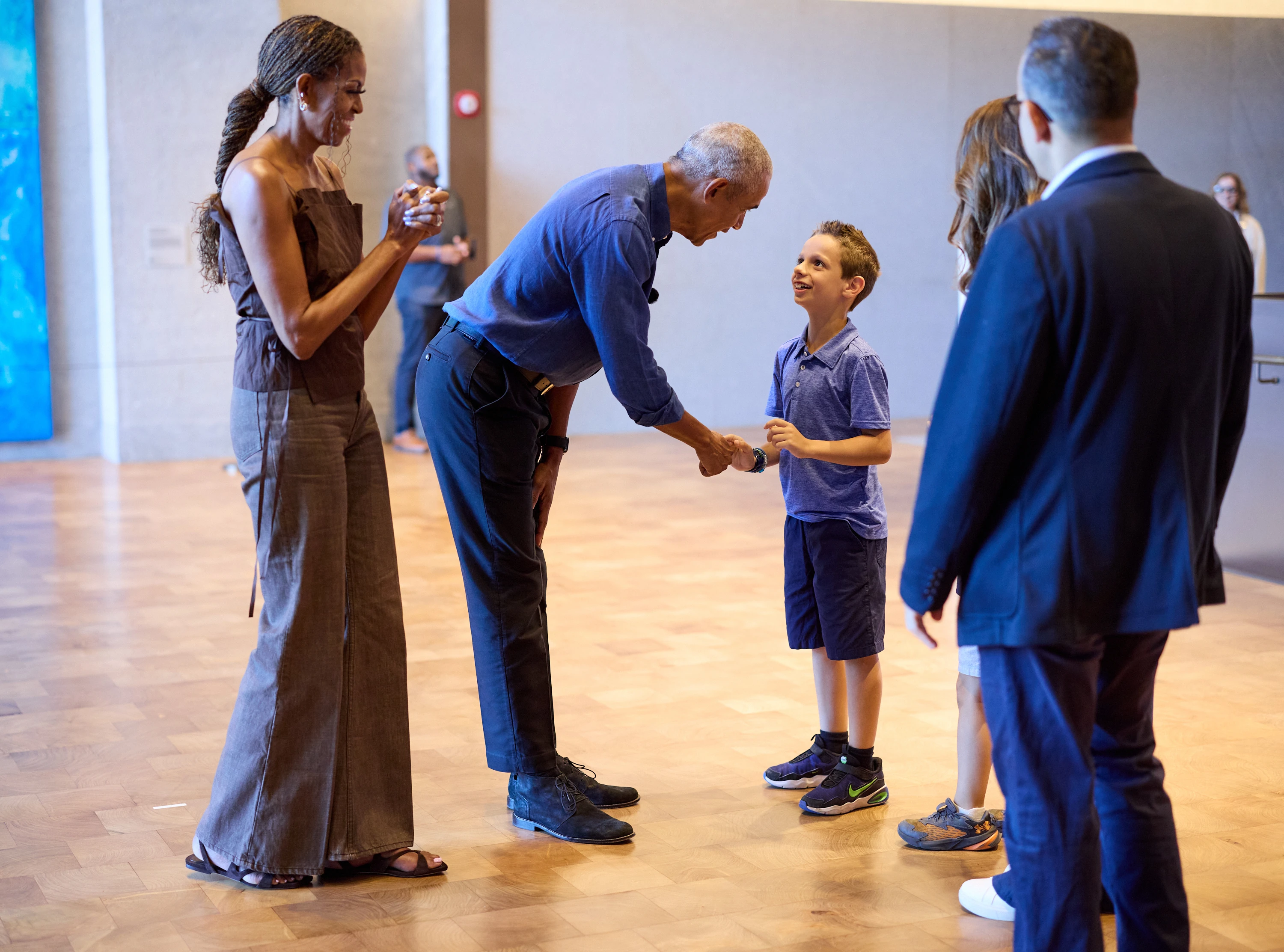 President and Mrs.Obama surprise first museum visitors on opening day at The Obama Presidential Center Museum.