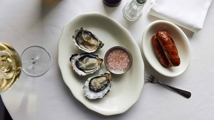 dish of oysters and Merguez Sausage at Builders Arms Hotel Sausage Festival
