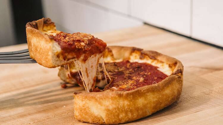 A deep-dish pizza. A deep-dish pizza.