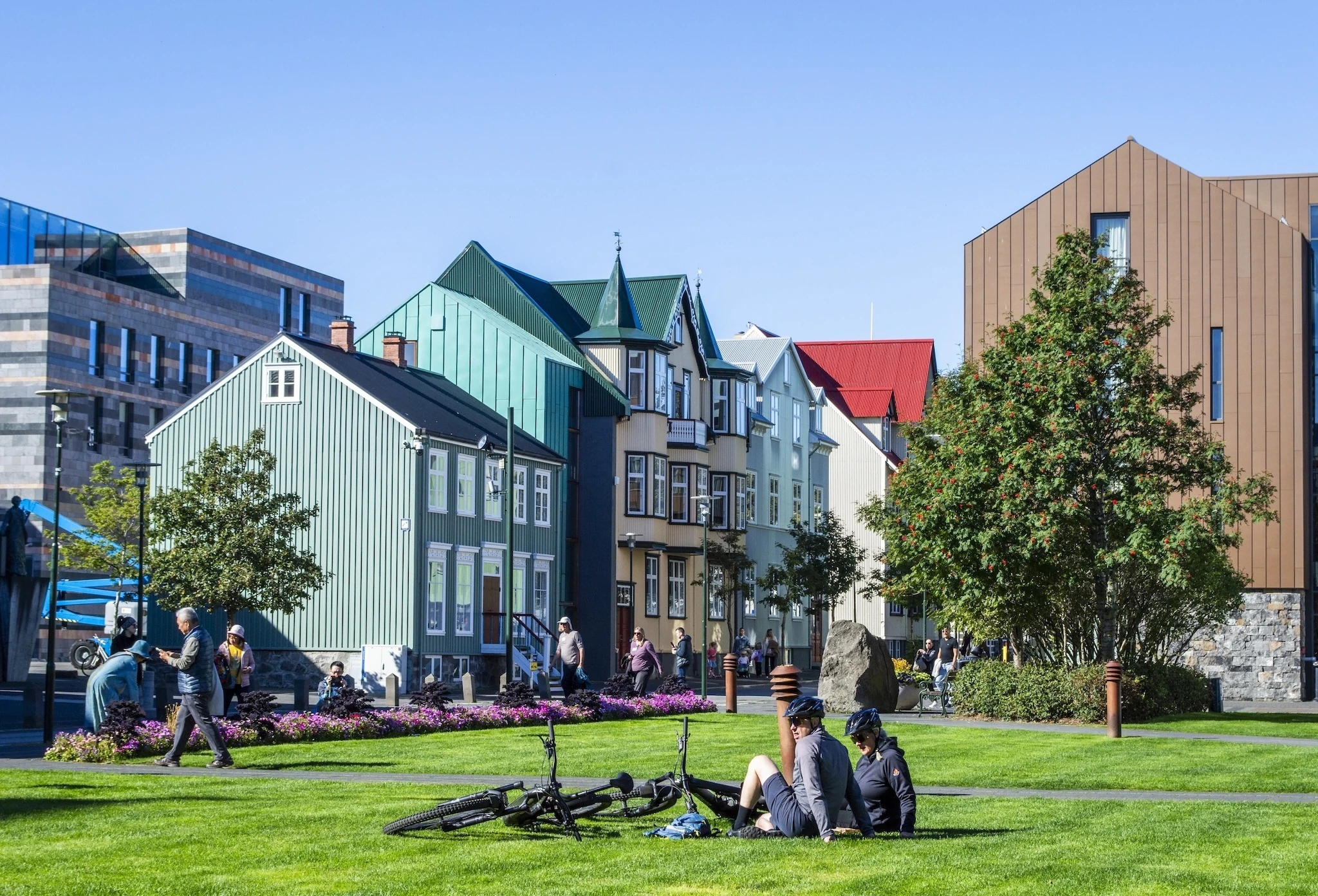 People enjoy time at Reykjavik city centre on a sunny day