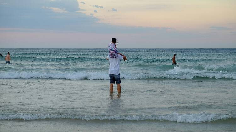 Dad with kid at beach