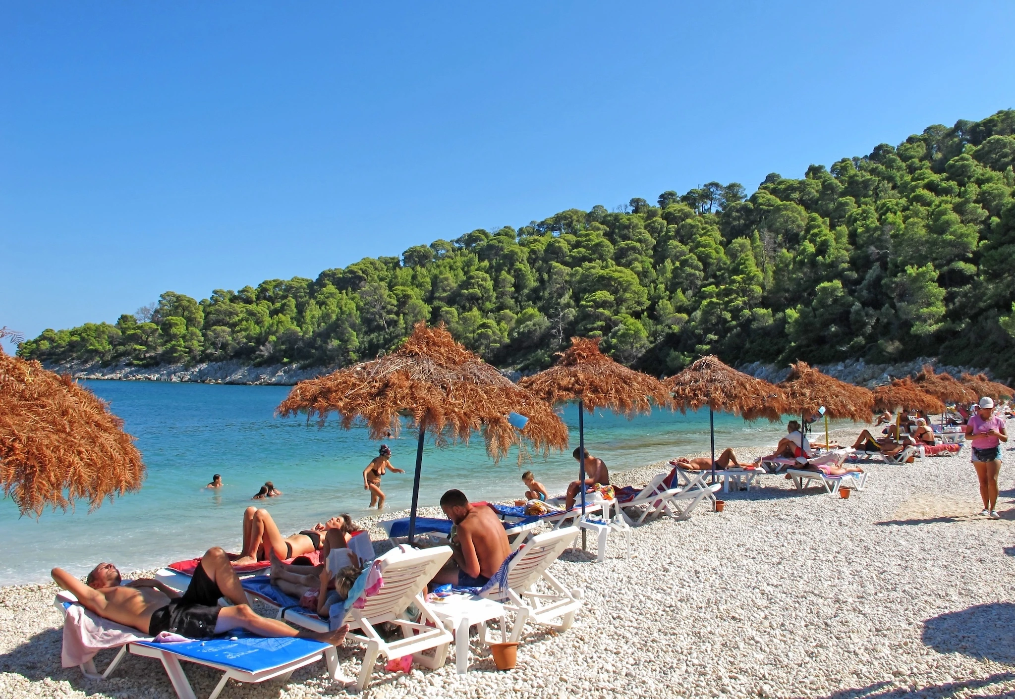 Tourists Milia Beach on the Greek island of Alonissos