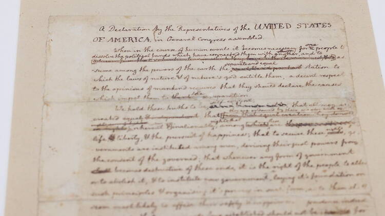 A close-up shot of a historical document in parchment paper A close-up shot of a historical document in parchment paper