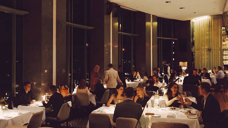 Altitude at Shangri La Sydney a busy dining room at night