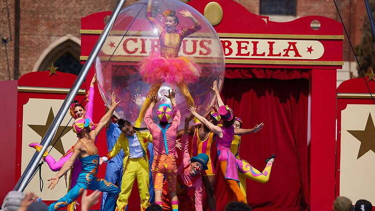 Wide shot of acrobats performing onstage Wide shot of acrobats performing onstage