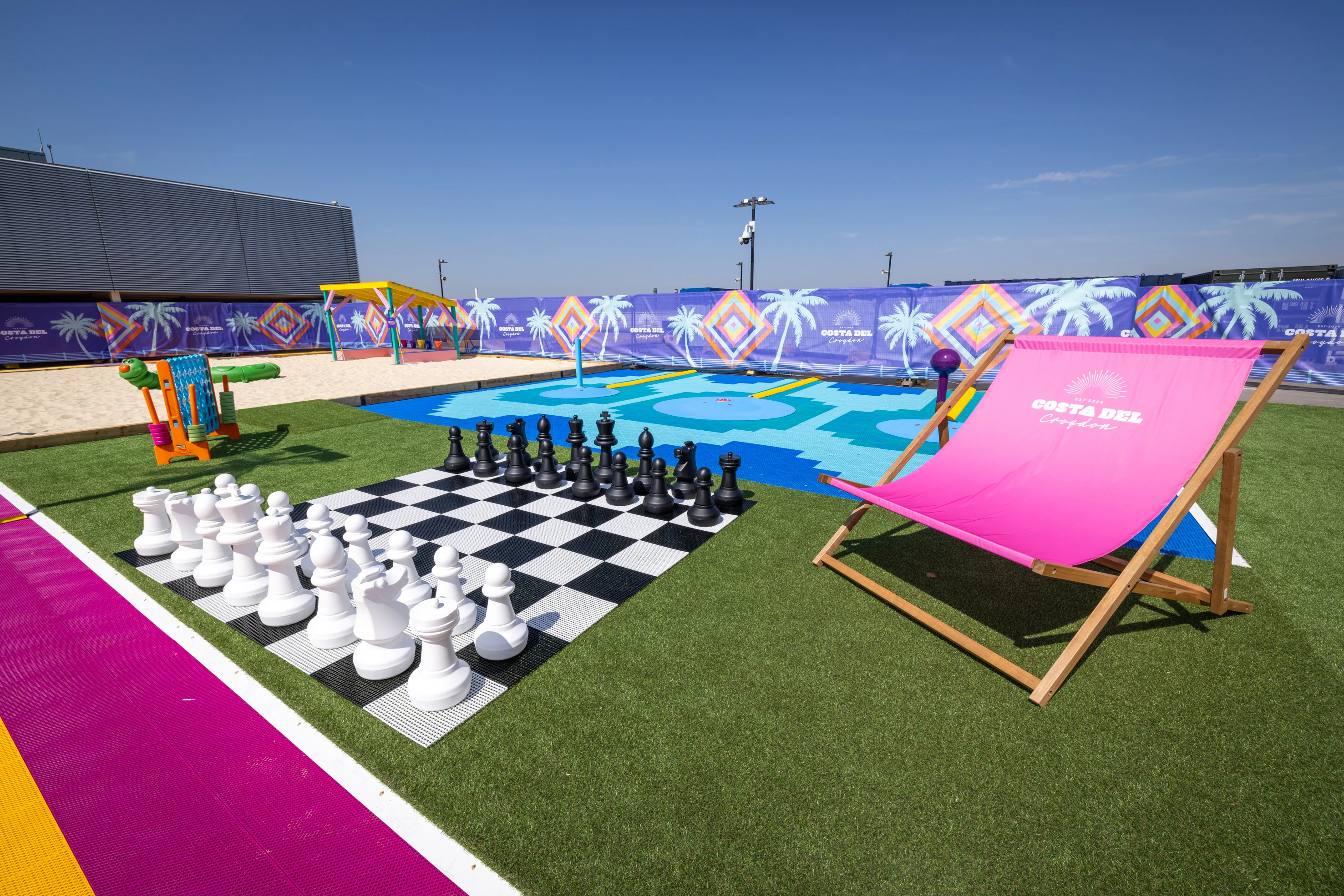 Giant chess and deck chair at Costa Del Croydon rooftop beach