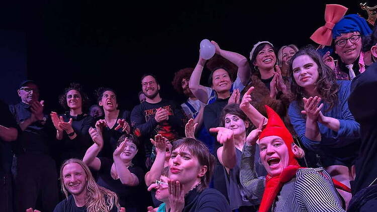 Wide shot view of people applauding Wide shot view of people applauding