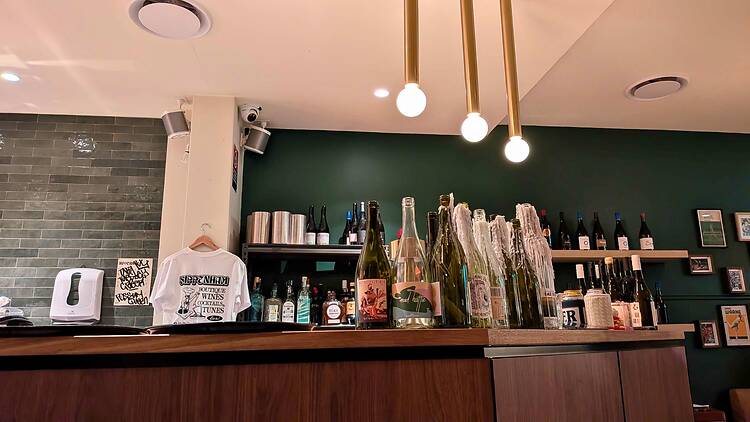 A bar with bottles on it