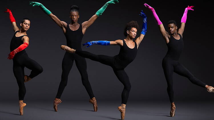 Wide shot view of dancers posing in ballet attire. Wide shot view of dancers posing in ballet attire.