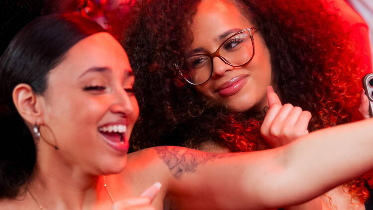 Close-up shot of two people smiling. Close-up shot of two people smiling.