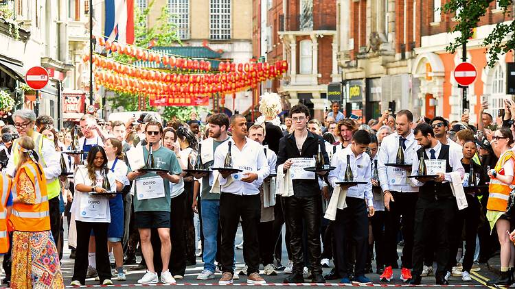 The Soho Waiters’ Race 2025 Contestants line up at the start line for the Soho Waiters’ Race