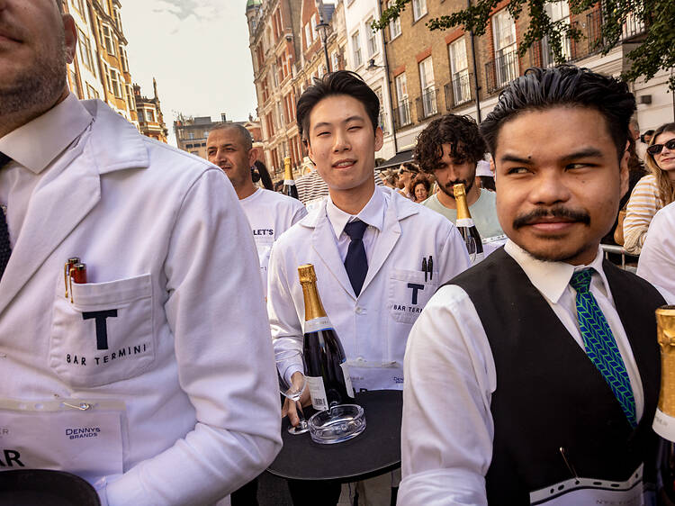 In pictures: chaotic scenes at Soho’s 2026 Waiters’ Race and Village Fête
