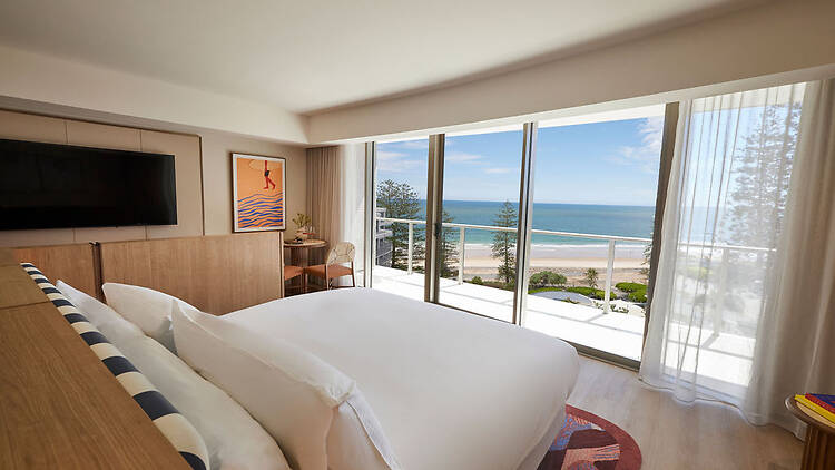 King bed overlooking ocean