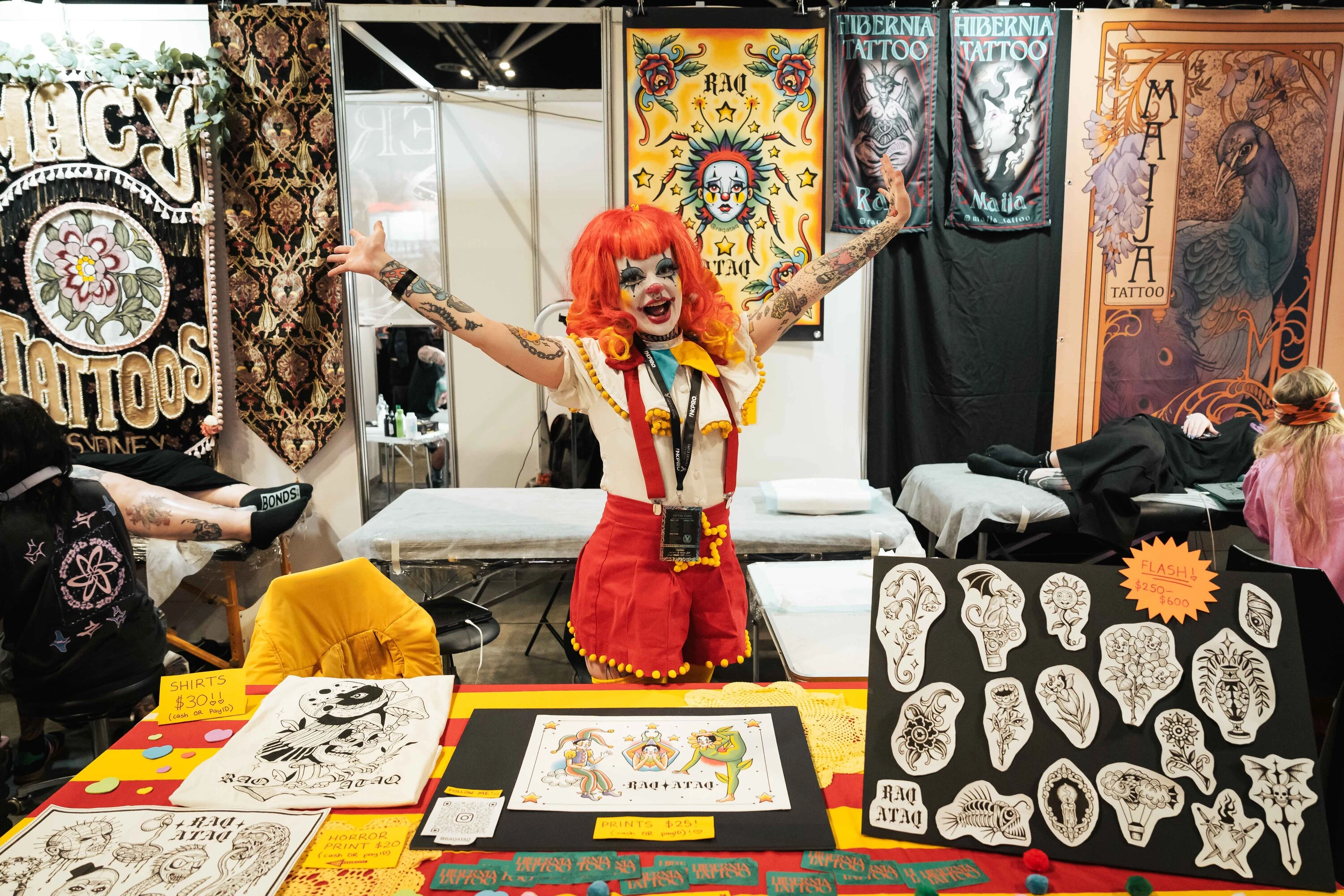 Tattoo artist at stall