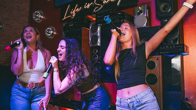 Singers at Sweet Caroline Karaoke Bar
