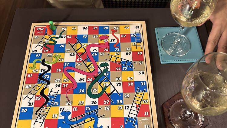 A game of Snakes and Ladders before dinner