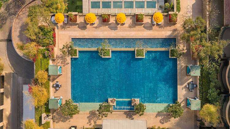 An aerial view of the pool at Taj Surajkund Resort & Spa