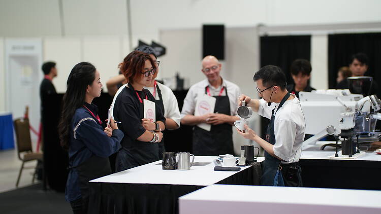 Competitors in action at the Singapore National Coffee Championship 2026 Competitors in action at the Singapore National Coffee Championship 2026