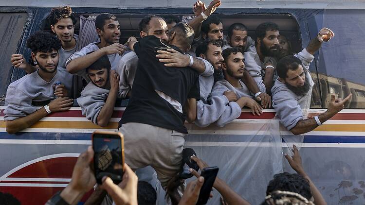 World Press Photo Palestinian detainees and prisoners arrive at Nasser Hospital.